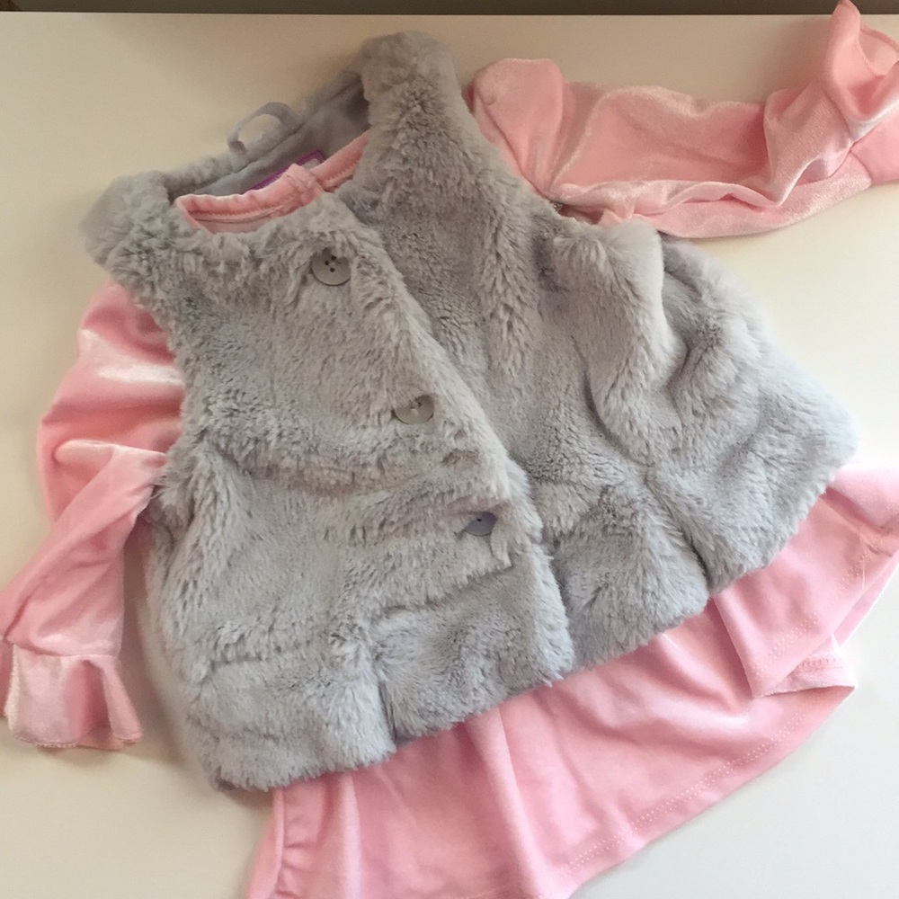 Pink swing dress and furry vest